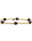 Goudkleurige armband voor dames met zwarte onyx edelstenen