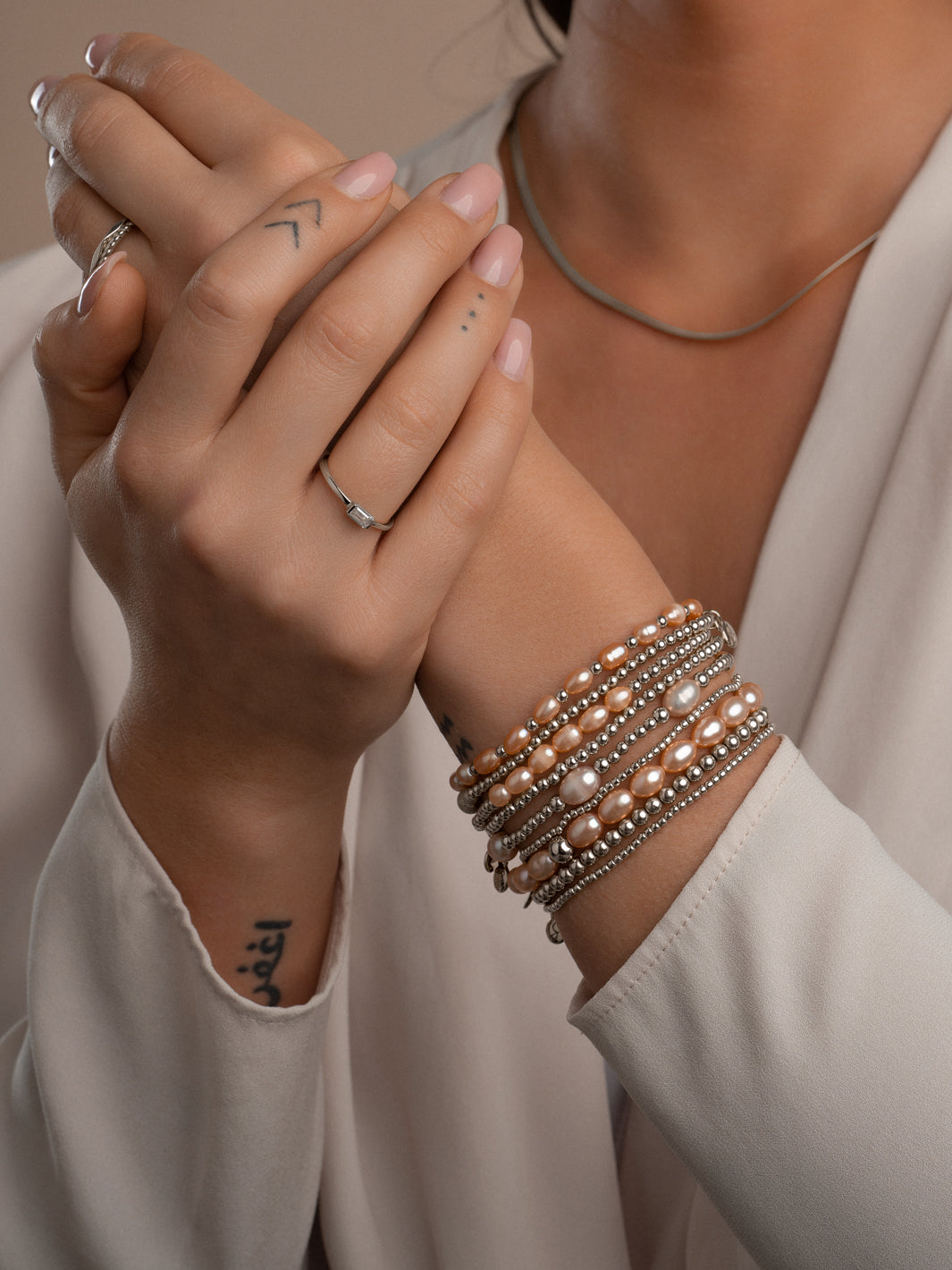 Armband om mee te zwemmen van Sparkling Jewels met zilveren kralen en parel