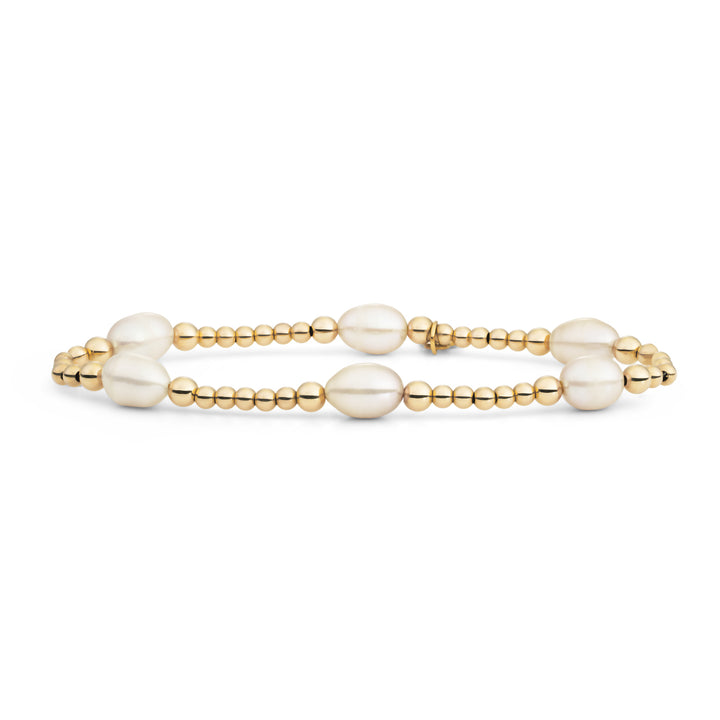 Parel armbandje met gouden accenten #kleur_goud