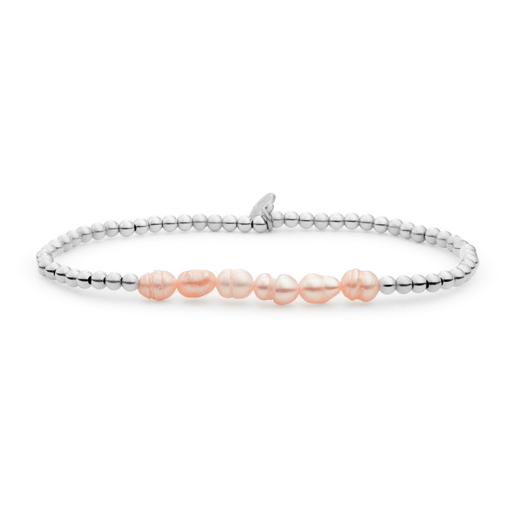 Armband parels perzikkleur voor dames met zilveren accenten die niet verkleuren #kleur_zilver