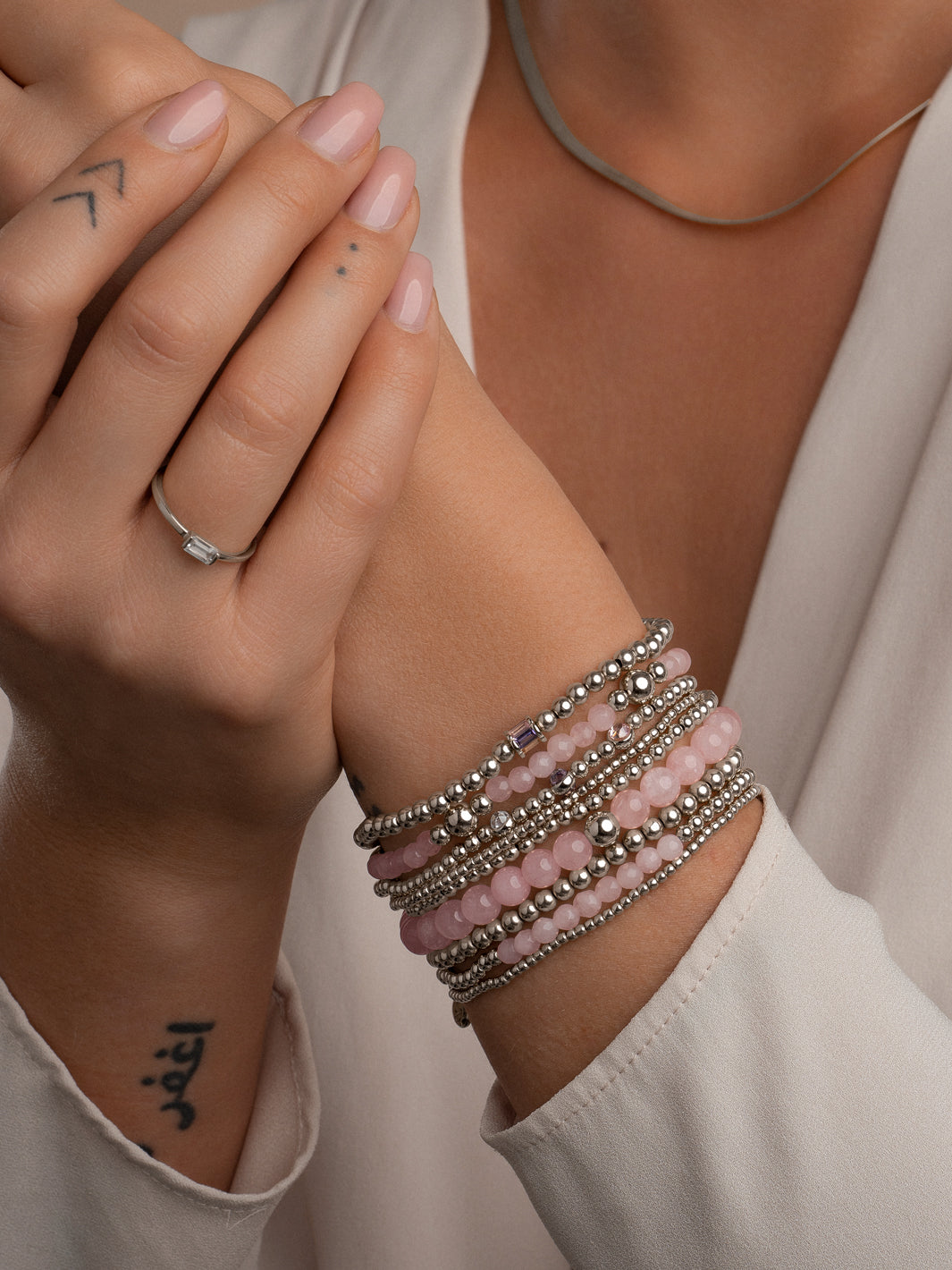Zilveren damesarmband met paars steentje #kleur_zilver